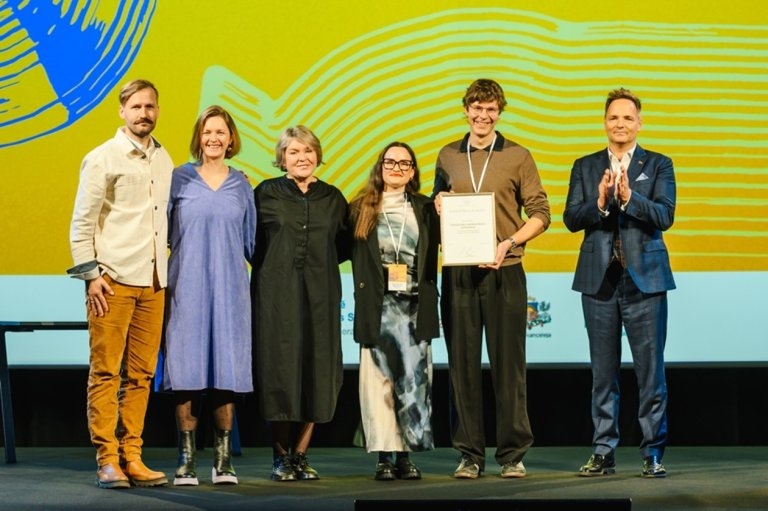 The Innovation laboratory team recieving a letter of appreciation from the Prime Minister of Latvia.